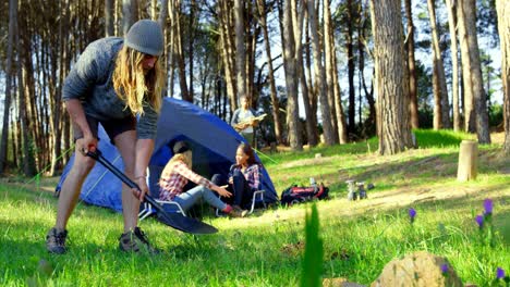 group of friends camping in the forest 4k