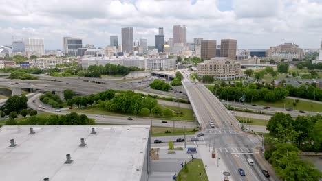 atlanta, georgia skyline and georgia state capitol building with drone video wide shot moving up