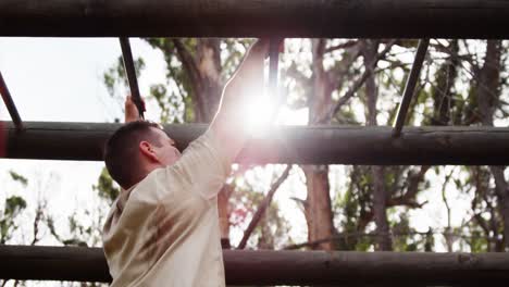 military soldier climbing monkey bars 4k