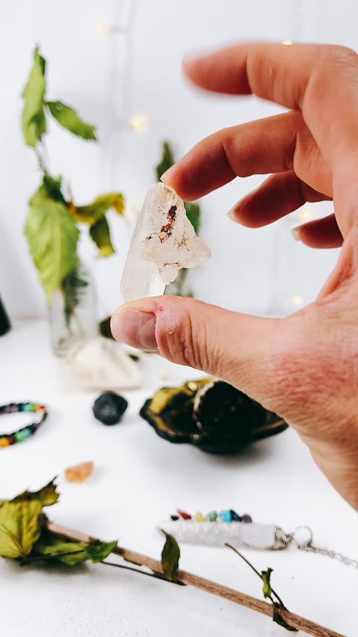 Clear Quartz Crystal in Hand