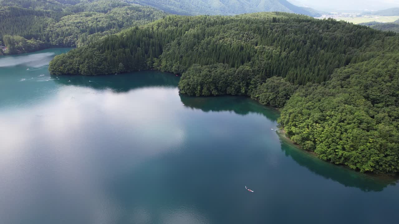 Picturesque Green Lush Nature Of Lake Aoki At Summer In Omachi, Nagano Prefecture, Japan. Aerial Drone Shot