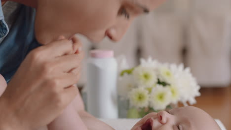 close up mother gently kissing baby enjoying loving mom playfully caring for toddler at home sharing connection with her newborn child healthy childcare