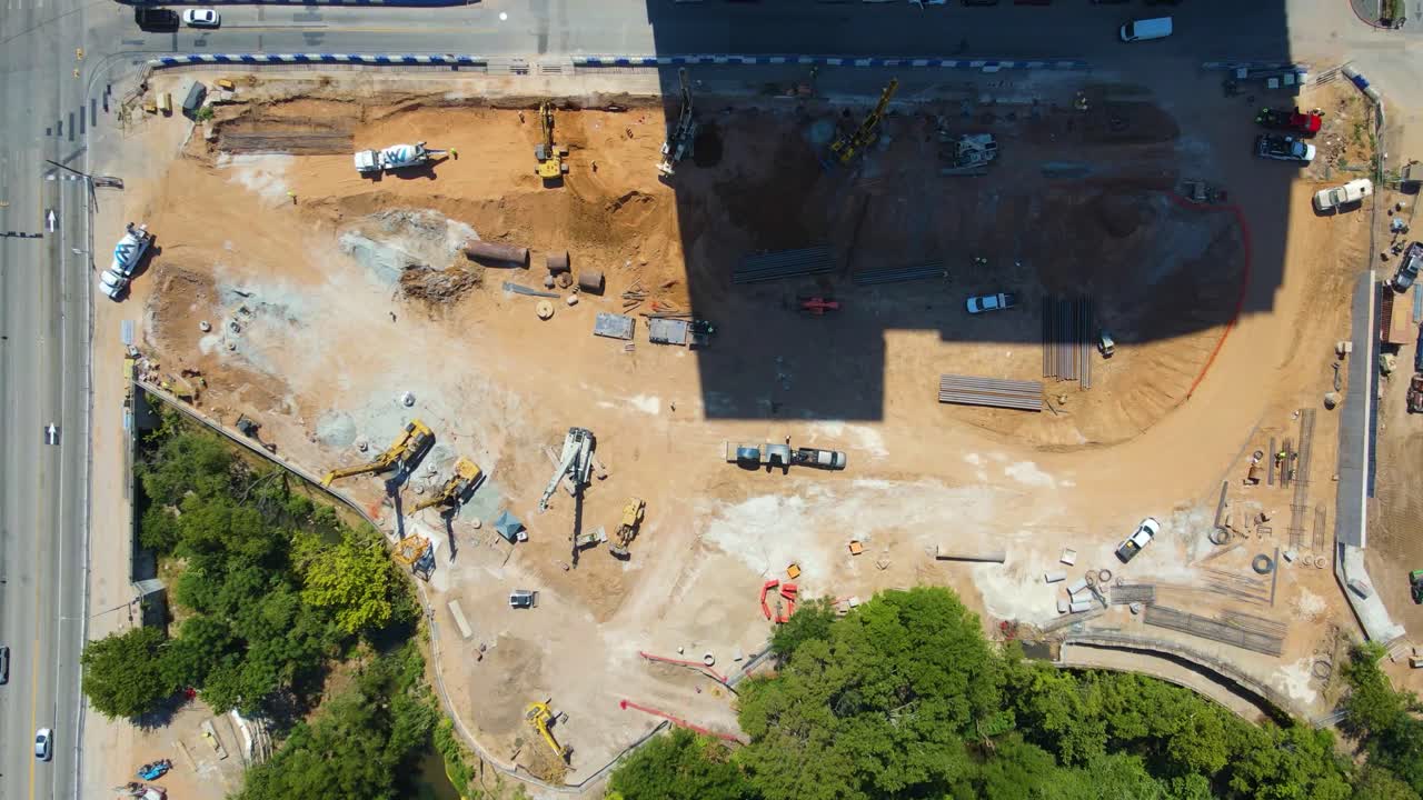 Fast time lapse of construction job site near heavy car traffic in Austin, Texas