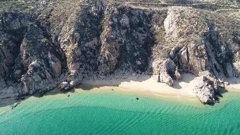 Playa-Balconcito-cliffs-and-serene-turquoise-waters-in-Cabo-San-Lucas