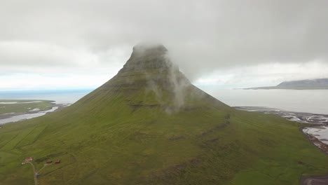 kirkjufell mountain shrouded in clouds, iceland