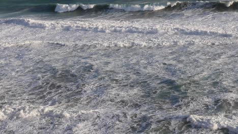 ocean waves crashing near twelve apostles, melbourne