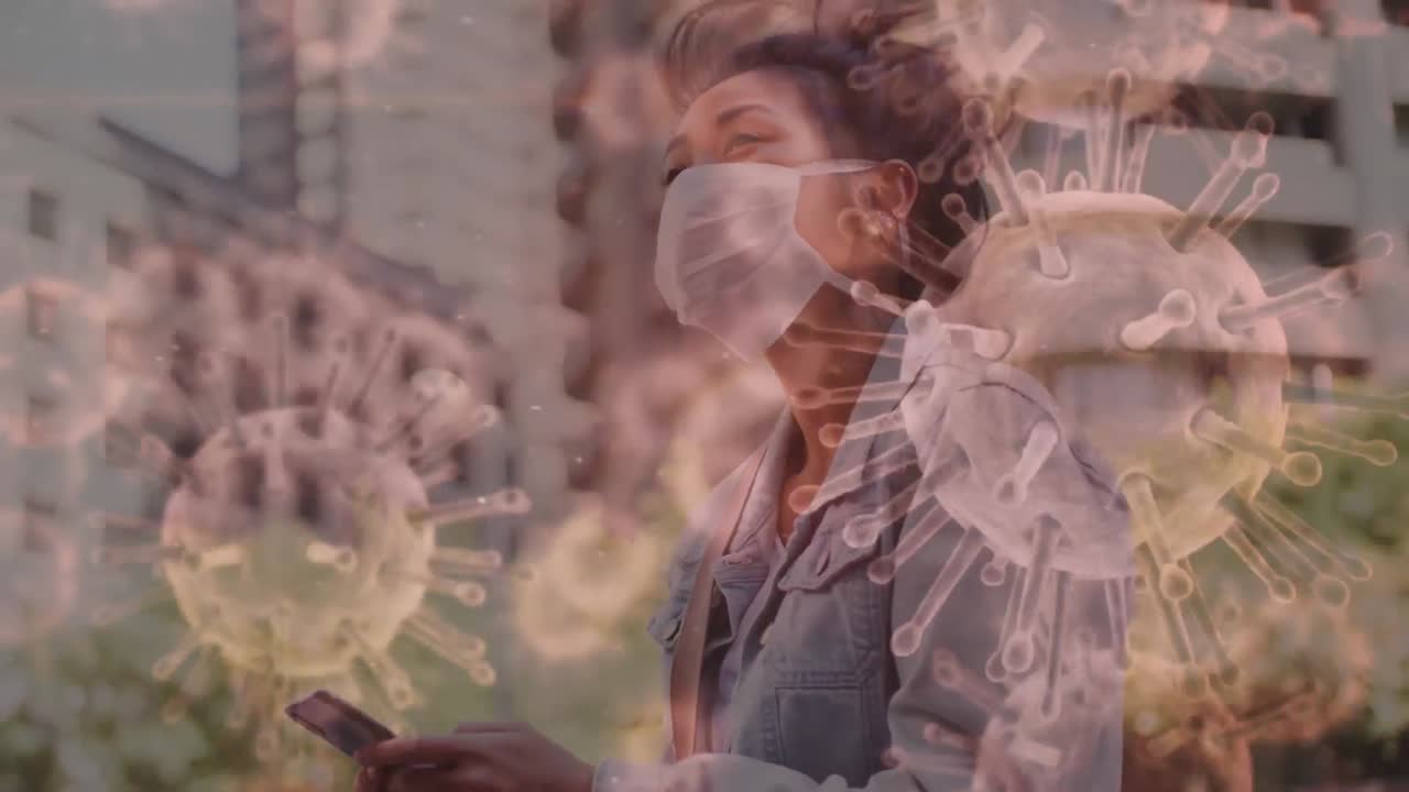 animación del macro virus y las células del coronavirus covid-19 que se propagan sobre una mujer que lleva una máscara