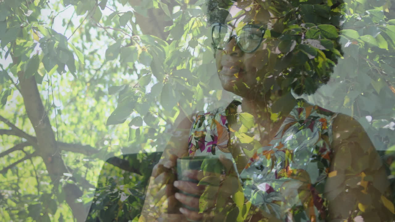 Holding cup, woman with leafy nature animation overlay creating serene atmosphere
