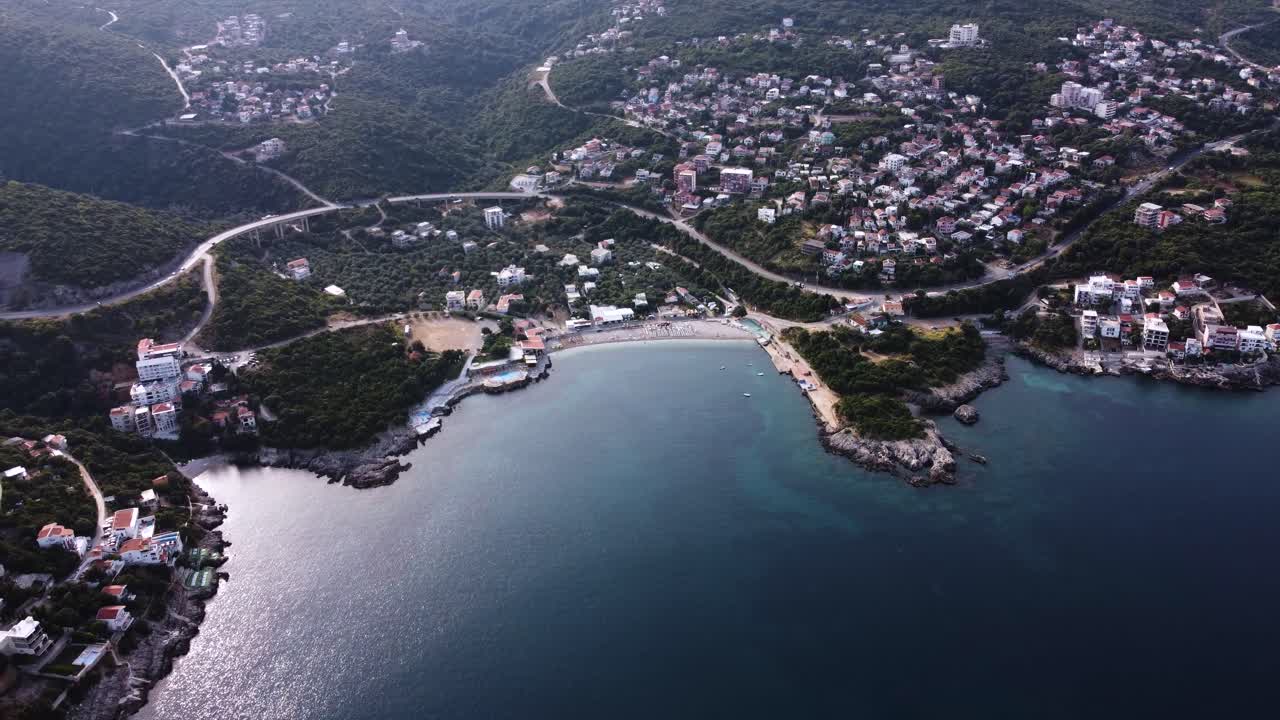 Tourist destination Utjeha with beach bay on shore of Montenegro, aerial
