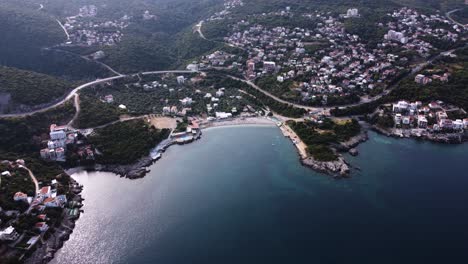 tourist destination utjeha with beach bay on shore of montenegro, aerial