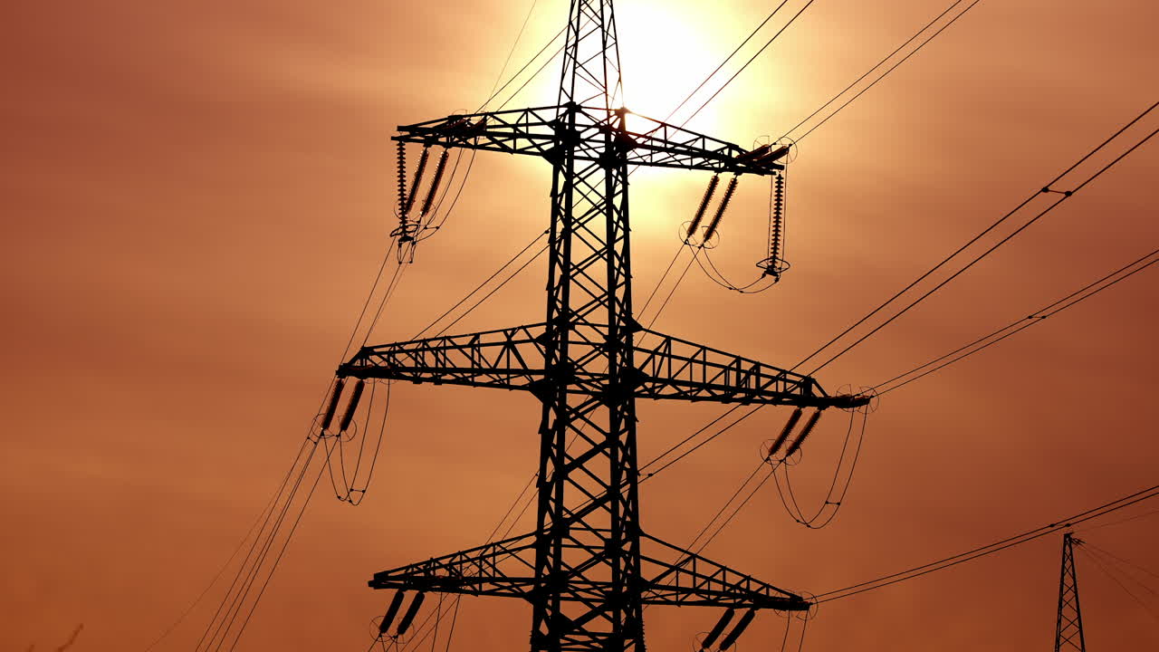 High power electricity poles. View of high voltage electrical transmission tower