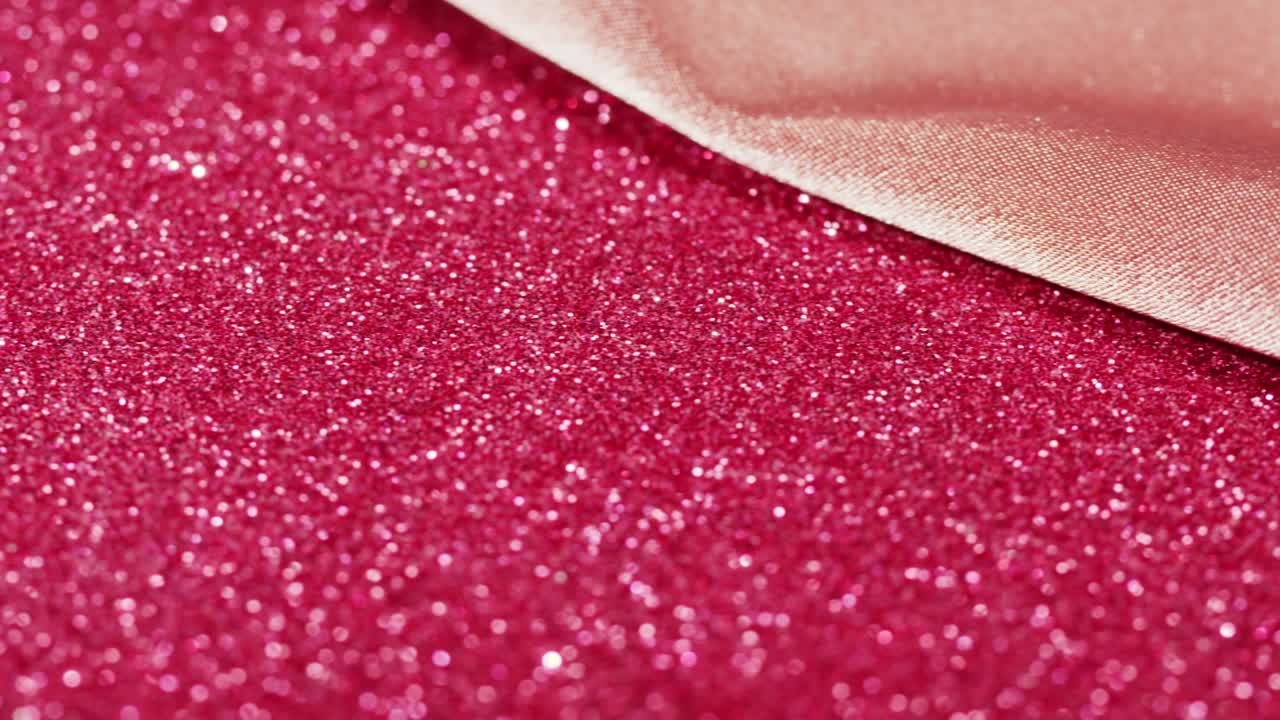 Pink glitter texture and silk satin cloth, bright shimmer close-up, shiny sparkle abstract background