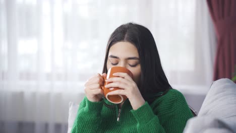 Happy-young-woman-relaxing-and-having-peace.