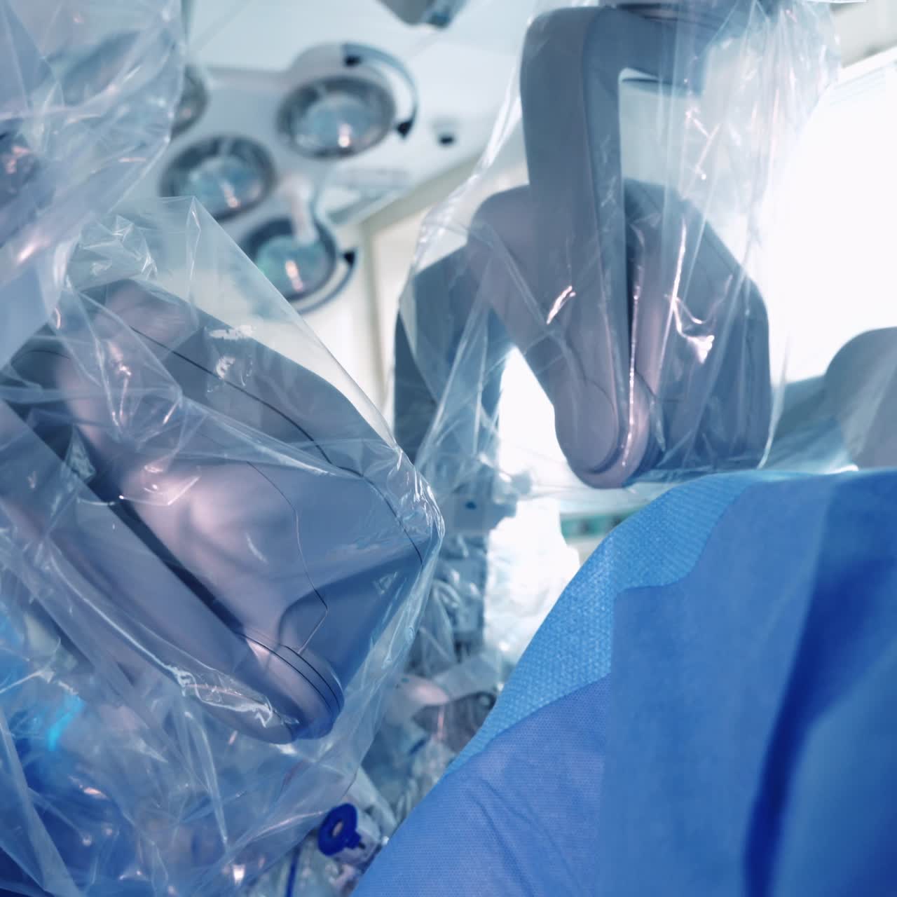 Robotic equipment at work in clinic. New medical device perform an operation to a patient. Modern technologies in medicine. Close-up.