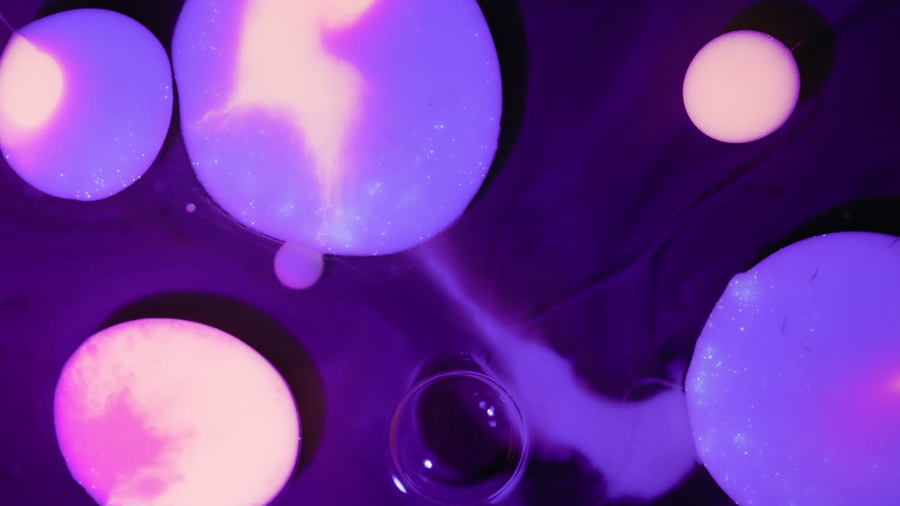 Purple Bubbles Coalescing In Abstract Art Fluid