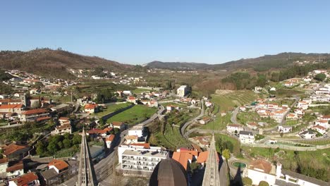 flying over cathedral in the countryside