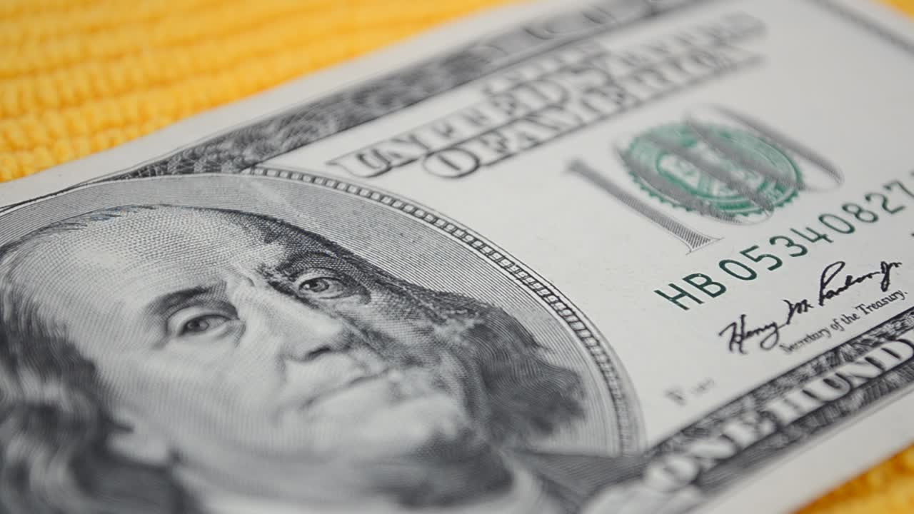 Macro shot of a 100 dollar. Shooting of a banknote