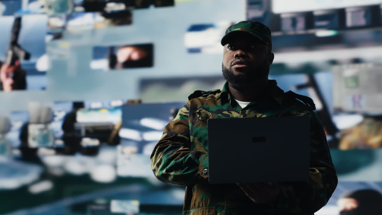Military officer reviewing data from surveillance and works on tactical operations