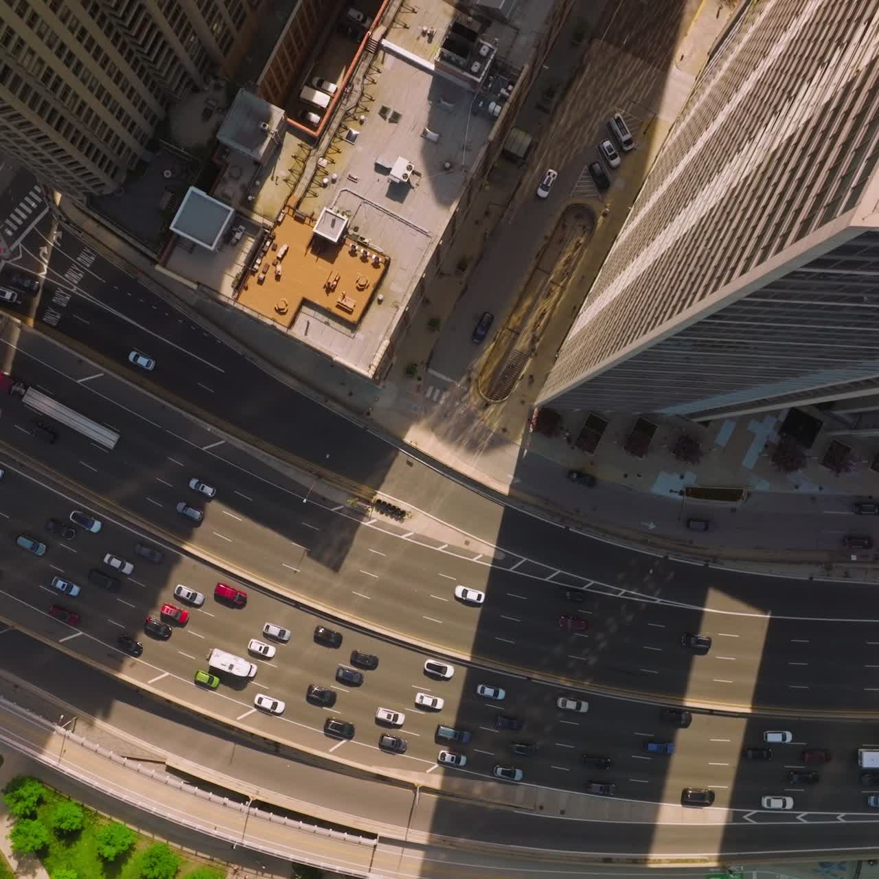 Speed highway with numerous automobiles going along. Busy traffic among the skyscrapers of Chicago