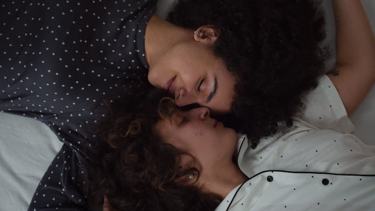 Lovely couple laying on bed