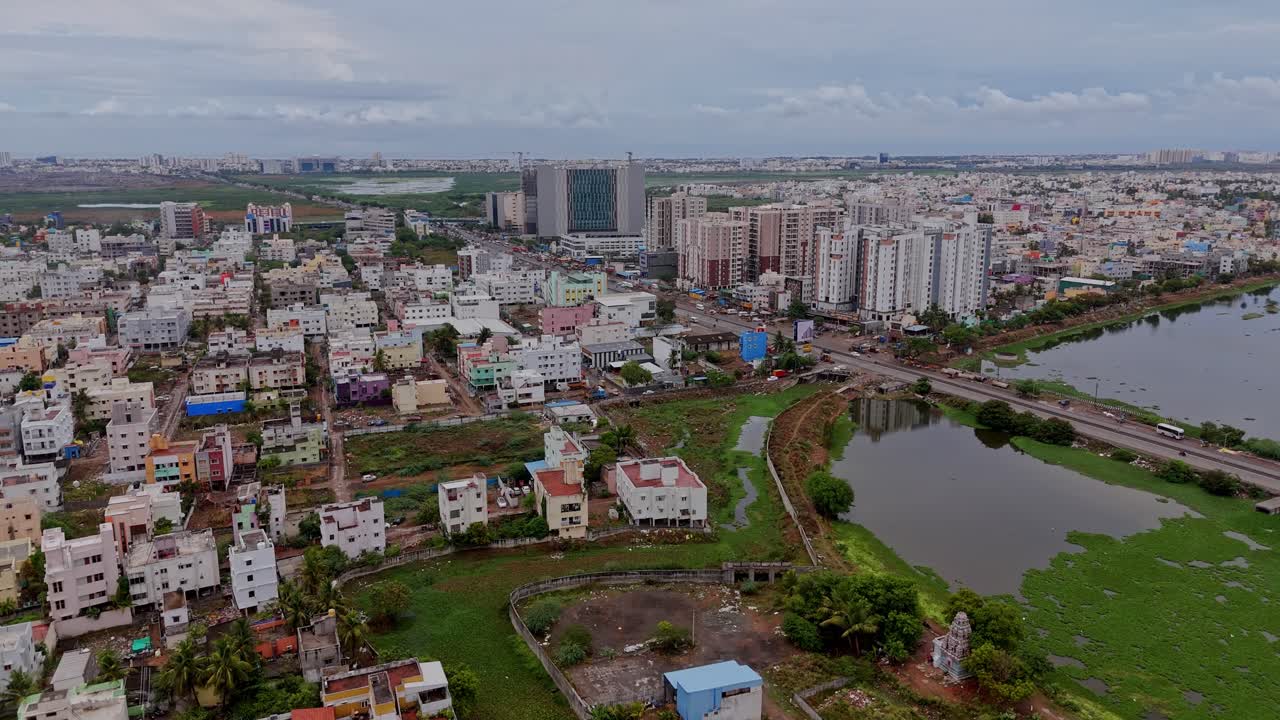 Mixed urban landscape with combination of residential and commercial buildings. Drone view.