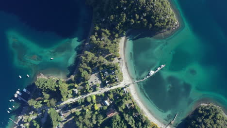 aerial - bahia brava bay and pier, villa la angostura, neuquen, argentina, top down