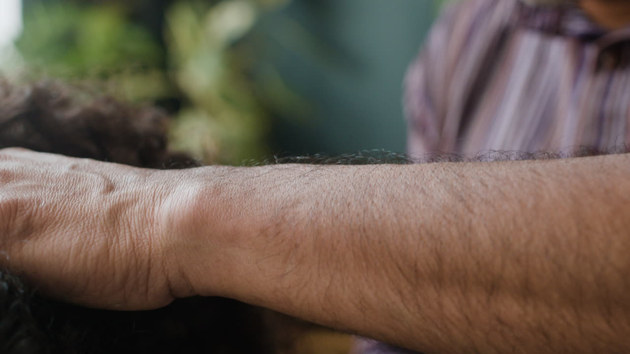 Man receiving head massage