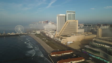 aerial over atlantic city, new jersey beach and casinos