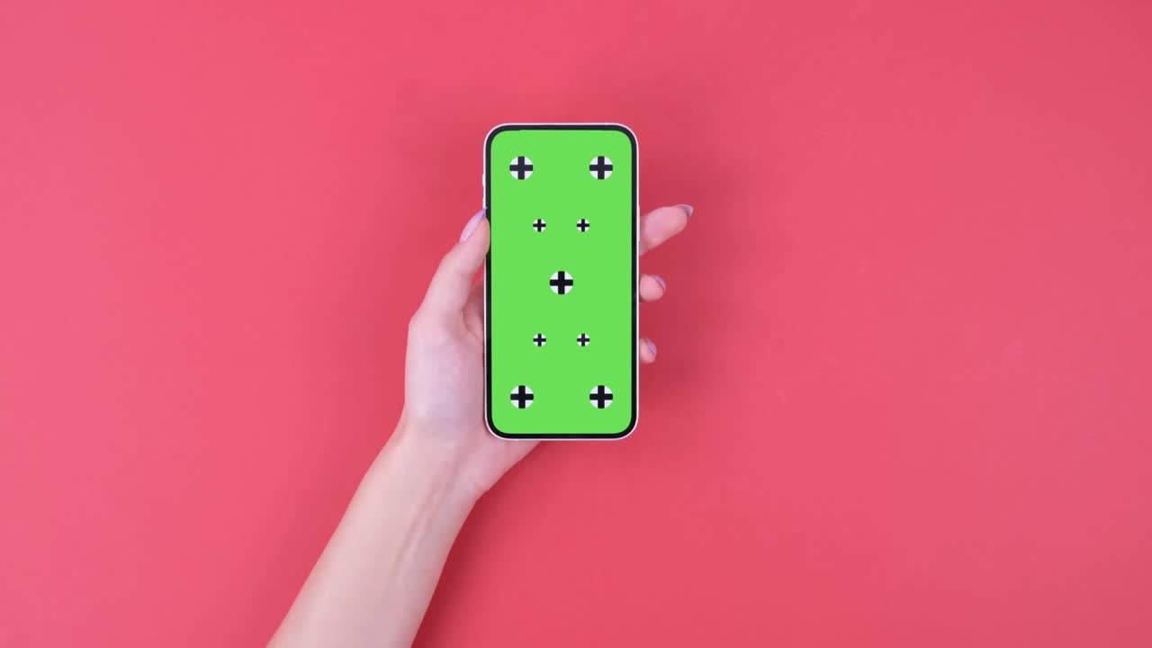 schermo del telefono su sfondo verde-rosso