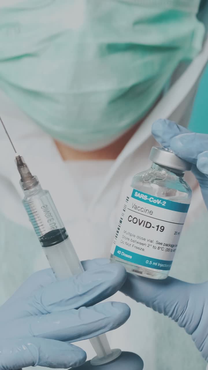 Healthcare workers administer covid19 vaccine in medical facility