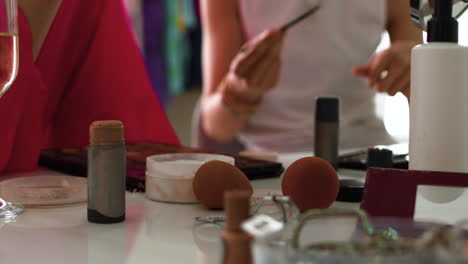 kitchen table with accessories and makeup elements