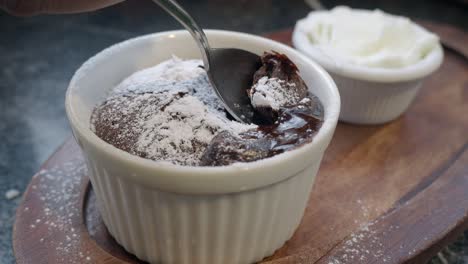 a delicious chocolate lava cake with whipped cream