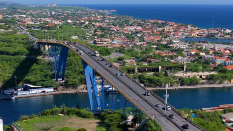 queen juliana bridge with punda district of willemstad curacao behind