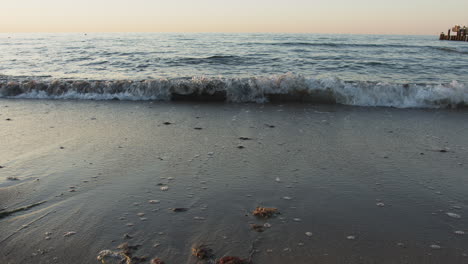 small waves reach the beach, wide angle, baltic sea, 4k