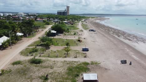 Flying-down-Brazilian-Peninsula-beach-in-desert-tropical-North-east