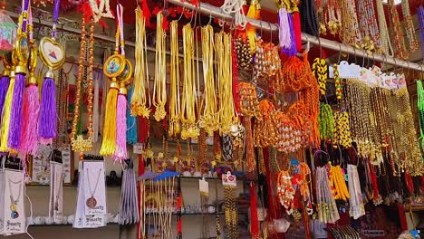 street-vendor-shop-selling-worship-items-for-pray-at-morning-video-is-taken-neelkanth-mahadev-rishikesh-uttrakhand-india-on-Mar-15-2022