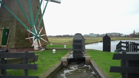 windmill pumping water from below sea-level polders into canals