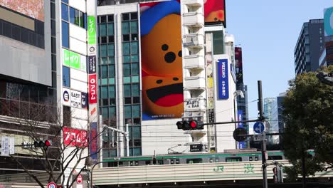 animated character on a digital billboard in a city