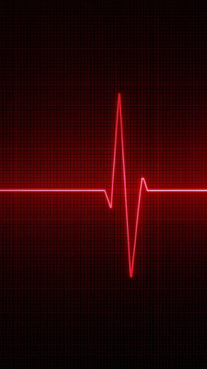 Video verticale: forma d'onda ECG rossa e incandescente pulsante, attivata dal battito cardiaco, che si muove sullo schermo a griglia