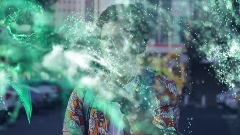 man in colorful shirt surrounded by swirling green abstract animation