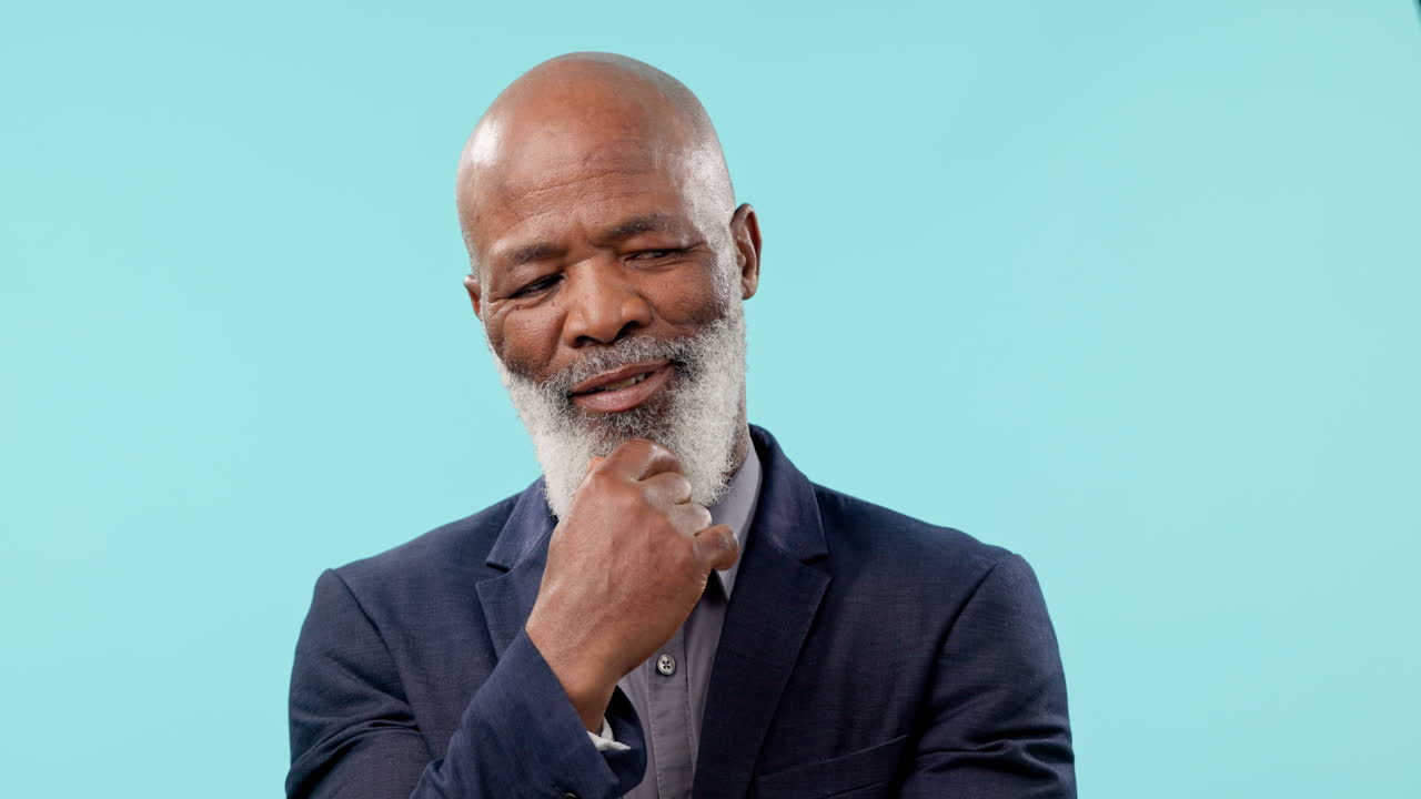 Face of mature black man in studio