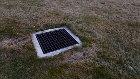 stormwater runoff grate with concrete basis tank