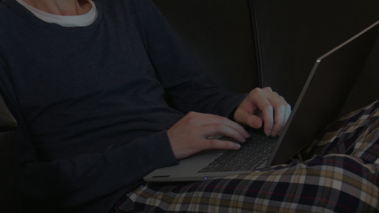 Young Man Sitting on a Couch