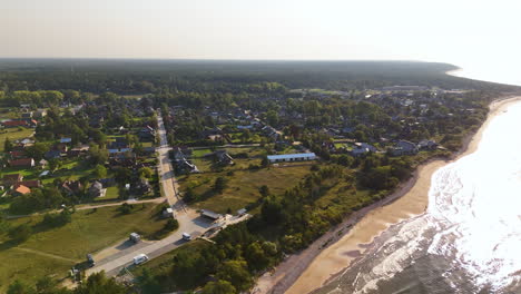 beachfront port town of pavilosta during summer in latvia. aerial drone shot