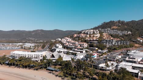 airlie beach, australia, coastal, oceanside town with marina, aerial view