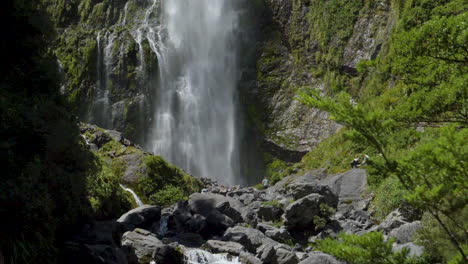 slow motion static footage of the bottom of the devil's punchbowl waterfall - arthur's pass, new zealand