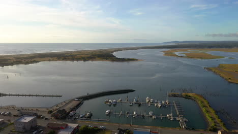 Port-of-Bandon,-Oregon---drone-shot-flying-backwards