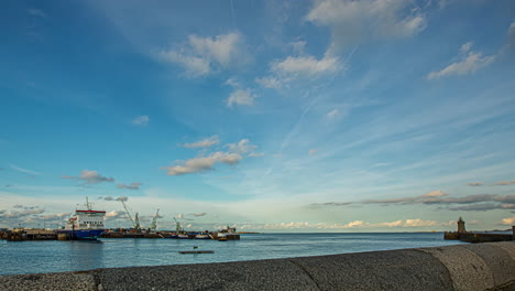 timelapse view of a large high ferry docking at the port in the guersey island in the english channel off the coast of normandy that is part of the bailiwick of guernsey before winter in 2013.