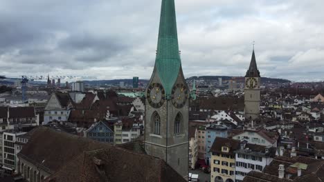 zurich clock tower and city view with limmar river