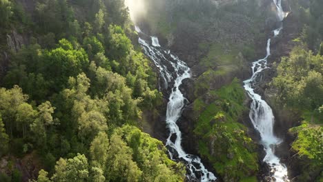 Latefossen-is-one-of-the-most-visited-waterfalls-in-Norway-and-is-located-near-Skare-and-Odda-in-the-region-Hordaland,-Norway.-Consists-of-two-separate-streams-flowing-down-from-the-lake-Lotevatnet.